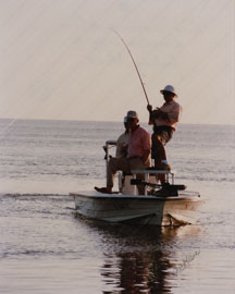 Dick Farmer and Tom Davidson enjoying a fishing break