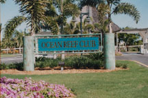 Ocean Reef Gate newer letters white on dark green background