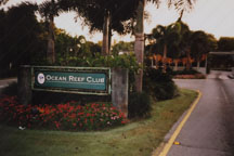 Ocean Reef Gate newer letters white on dark green background