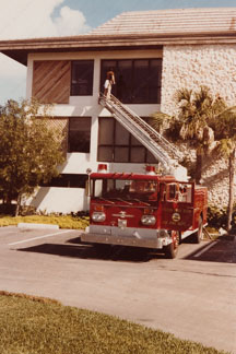 Washing windows of the plaza building with the help of the fire department